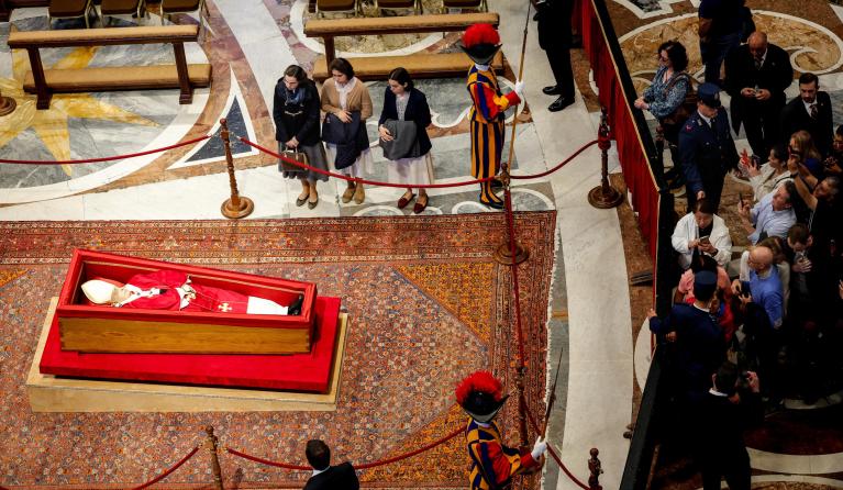 Members of the public pay their respects to the late Pope Francis as he lies in state at Saint Peter's Basilica, in Vatican City, 23 April 2025. Faithfull and well-wishers will be able pay their respects to the spiritual leader, who died on 21 April 2025, aged 88, until his funeral on 26 April in the plaza in front of the basilica. EPA/GIUSEPPE LAMI