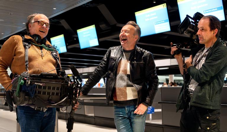 Cameraman, geluidsman en presentator