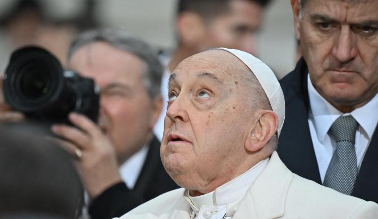 Pope Francis prays in front of the statue of the Virgin Mary near Piazza di Spagna in central Rome, for the Solemnity of the Immaculate Conception, on December 08, 2023.  Filippo MONTEFORTE / AFP