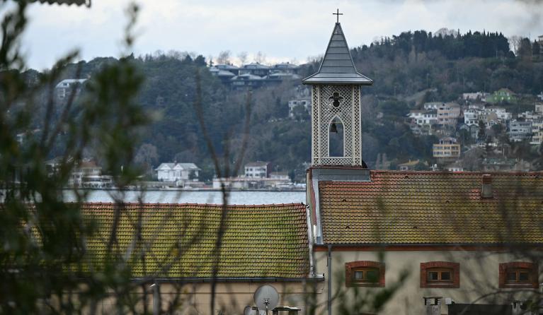 This photograph shows a general view and bell tower of Santa Maria church after an attack in Istanbul, on January 28, 2024. Two assailants launched an armed attack on an Italian church in Istanbul during a religious ceremony on January 28, 2024, leaving one person dead, Turkey's interior minister said. OZAN KOSE / Afp