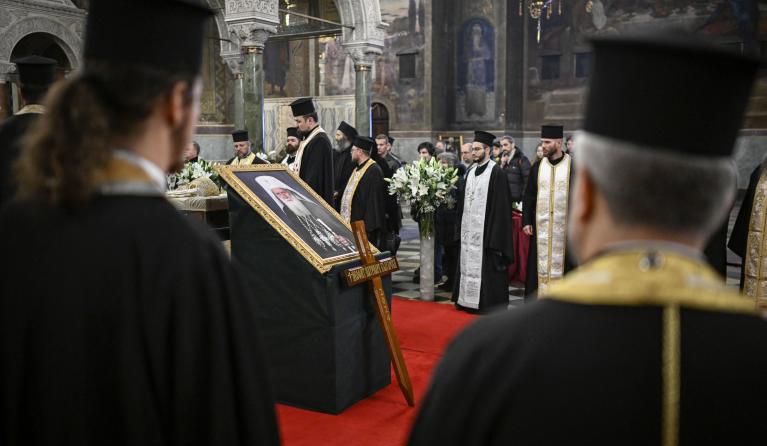 Priests pay respect to late Patriarch Neophyte of Bulgaria's Orthodox Church during a funeral service at the golden-domed "Alexander Nevski" cathedral in Sofia on March 15, 2024. Bulgaria bid its last farewell to its Christian Orthodox religious leader Patriarch Neophyte, who died on March 13 at the age of 78. Nikolay DOYCHINOV / AFP