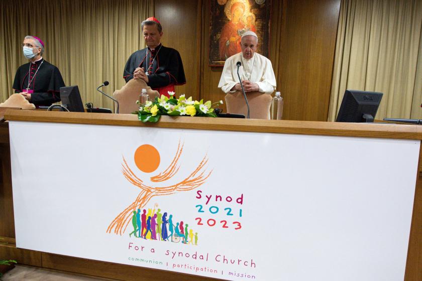 This handout picture taken and released on October 9, 2021 by Vatican Media shows Pope Francis (C) during the opening of the Synod at the Vatican. VATICAN MEDIA / AFP This handout picture taken and released on October 9, 2021 by Vatican Media shows Pope Francis (C) during the opening of the Synod at the Vatican.