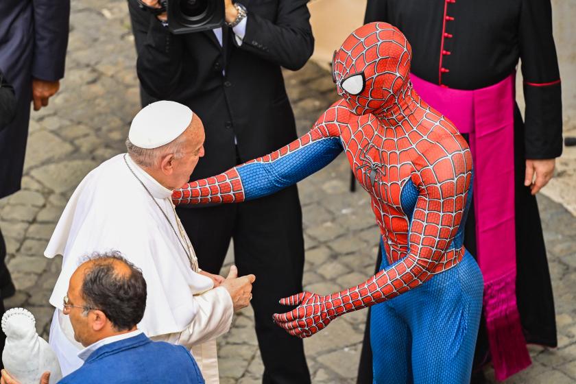 Pope Francis goes to shake hand with a man wearing a costume of the Spider-Man fantasy character, who performs in hospitals for sick children, at the end of the weekly general audience on June 23, 2021 at San Damaso courtyard in the Vatican. Alberto PIZZOLI / AFP Pope Francis goes to shake hand with a man wearing a costume of the Spider-Man fantasy character, who performs in hospitals for sick children, at the end of the weekly general audience on June 23, 2021 at San Damaso courtyard in the Vatican.