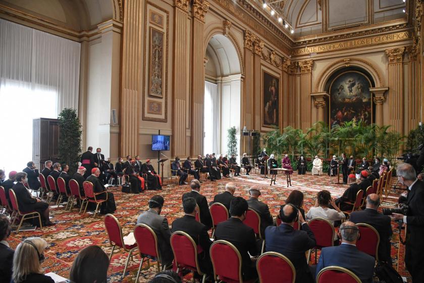 A general view shows Pope Francis (Rear R at center), religious leaders, politicians and scientists during the meeting "Faith and Science: Towards COP26" on October 4, 2021 in The Vatican, sending an appeal to participants in the 26th United Nations Climate Change Conference, also known as COP26, scheduled from November 1 to 12 in Glasgow, Scotland. ALESSANDRO DI MEO / POOL / AFP A general view shows Pope Francis (Rear R at center), religious leaders, politicians and scientists during the meeting "Faith and Science: Towards COP26" on October 4, 2021 in The Vatican, sending an appeal to participants in the 26th United Nations Climate Change Conference, also known as COP26, scheduled from November 1 to 12 in Glasgow,