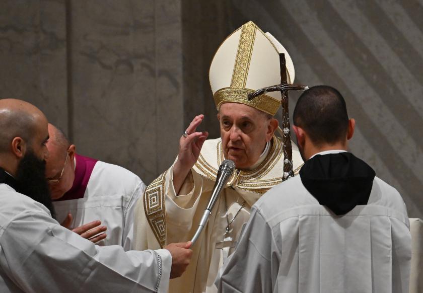 Pope Francis (C) gestures during the end of year Vespers and Te Deum prayer at St. Peter's Basilica in The Vatican on December 31, 2022. The End of year vespers at St Peter’s Basilica takes place as former pope Benedict XVI, who in 2013 became the first pontiff in six centuries to step down as head of the Catholic Church, died on December 31, 2022 at the age of 95, the Vatican announced. Filippo MONTEFORTE / AFP Pope Francis (C) gestures during the end of year Vespers and Te Deum prayer at St. Peter's Basilica in The Vatican on December 31, 2022. The End of year vespers at St Peter’s Basilica takes place as former pope Benedict XVI, who in 2013 became the first pontiff in six centuries to step down as head of the Catholic Church, died on December 31, 2022 at the age of 95, the Vatican announced. Filippo MONTEFORTE / AFP