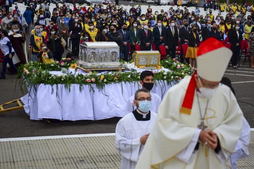 Catholic faithfuls attend a mass after the arrival of the relic of Paraguayan Carmelite nun Maria Felicia de Jesus Sacramentado, popularly known as Chiquitunga, at Silvio Pettirossi International Airport in Luque, Paraguay on Setember 21, 2021. Pope Francis approved the beatification of Chiquitunga (1925-1959) in March 2018. NORBERTO DUARTE / AFP Catholic faithfuls attend a mass after the arrival of the relic of Paraguayan Carmelite nun Maria Felicia de Jesus Sacramentado, popularly known as Chiquitunga, at Silvio Pettirossi International Airport in Luque, Paraguay on Setember 21, 2021. Pope Francis approved the beatification of Chiquitunga (1925-1959) in March 2018.