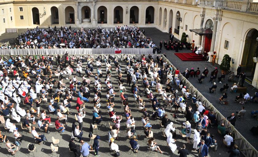 Pope Francis (R) holds the weekly general audience, at San Damaso courtyard in The Vatican, on June 30, 2021. Tiziana FABI / AFP Pope Francis (R) holds the weekly general audience, at San Damaso courtyard in The Vatican, on June 30, 2021.
