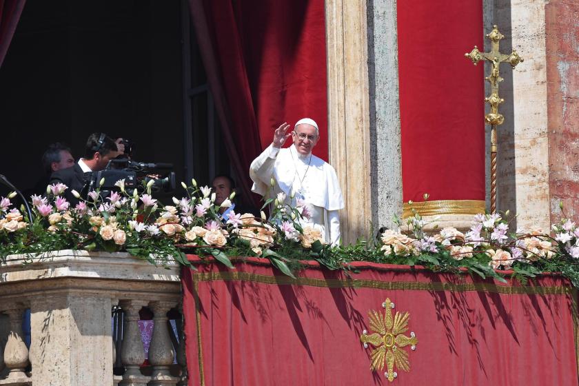 Pope Francis waves to the crowd during his Easter Urbi et Orbi blessing on the principal balcony of Saint Peter's Basilica at the Vatican, Vatican City, 16 April 2017. Easter is celebrated around the world by Christians to mark the resurrection of Jesus from the dead and the foundation of the Christian faith.