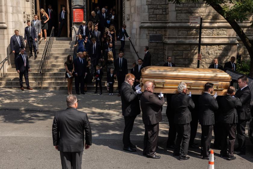 Former US President Donald Trump, former US First Lady Melania Trump, Ivanka Trump, Eric Trump, and other mourners look on as the remains of Ivana Trump are carried out from St Vincent Ferrer Roman Catholic Church during her funeral service in New York, on July 20, 2022. Ivana Trump, the first wife of former US President Donald Trump, died of "blunt impact injuries" to the torso in an accident on July 14, 2022, New York's chief medical examiner said on July 15. The statement did not specify the circumstances, but US media reported that police had been investigating whether the 73-year-old died falling down the stairs at her Manhattan home.
Yuki IWAMURA / AFP Former US President Donald Trump, former US First Lady Melania Trump, Ivanka Trump, Eric Trump, and other mourners look on as the remains of Ivana Trump are carried out from St Vincent Ferrer Roman Catholic Church during her funeral service in New York, on July 20, 2022. Ivana Trump, the first wife of former US President Donald Trump, died of "blunt impact injuries" to the torso in an accident on July 14, 2022, New York's chief medical examiner said on July 15. The statement did not specify the circumstance