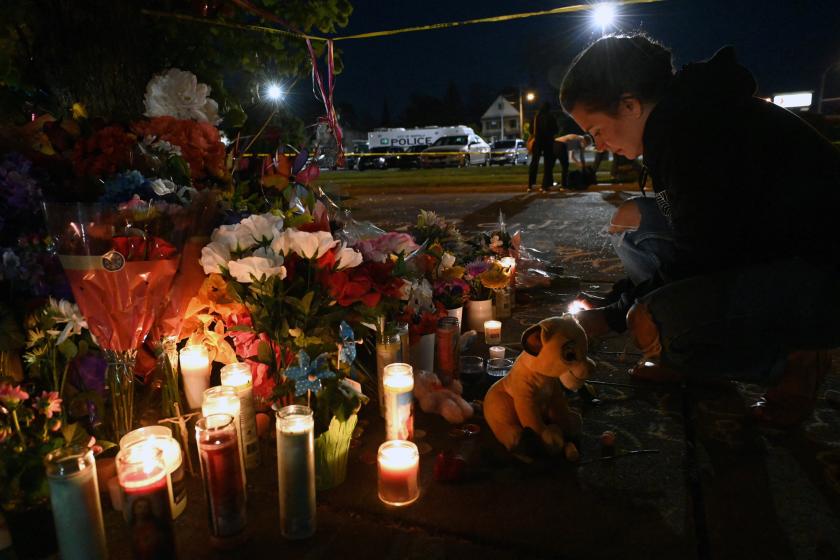 People light candles at a makeshift memorial near a Tops Grocery store in Buffalo, New York, on May 15, 2022, the day after a gunman shot dead 10 people. Grieving residents from the US city of Buffalo held vigils Sunday after a white gunman who officials have deemed "pure evil" shot dead 10 people at a grocery store in a racially-motivated rampage People light candles at a makeshift memorial near a Tops Grocery store in Buffalo, New York, on May 15, 2022, the day after a gunman shot dead 10 people. Grieving residents from the US city of Buffalo held vigils Sunday after a white gunman who officials have deemed "pure evil" shot dead 10 people at a grocery store in a racially-motivated rampage