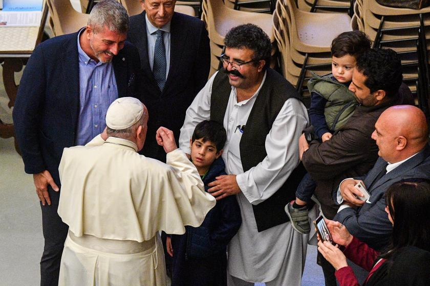 Pope Francis (Front L) meets with members of an Afghan family during the weekly general audience on October 13, 2021 at Paul-VI hall in The Vatican. Tiziana FABI / AFP Pope Francis (Front L) meets with members of an Afghan family during the weekly general audience on October 13, 2021 at Paul-VI hall in The Vatican. Tiziana FABI / AFP
