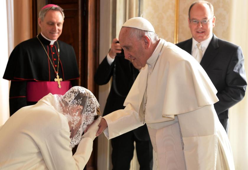 Prince Albert II of Monaco's wife Charlene (L) looks at a box of gift during a private audience with Pope Francis (R) at the Vatican, 18 January 2016. EPA/FILIPPO MONTEFORTE Prince Albert II of Monaco's wife Charlene (L) looks at a box of gift during a private audience with Pope Francis (R) at the Vatican, 18 January 2016. EPA/FILIPPO MONTEFORTE