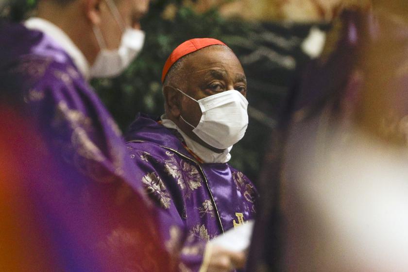 US Cardinal Wilton D. Gregory attends a Pope's Mass with new cardinals on November 29, 2020 at St. Peter's basilica in The Vatican. Pope Francis created 13 new cardinals on November 28, including Gregory, the first African-American, putting his personal stamp on the body that will one day choose his successor. Gregorio Borgia / POOL / AFP Wilton Gregory van Washington