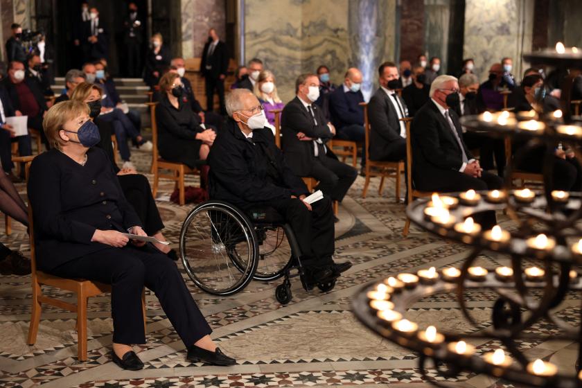 German Chancellor Angela Merkel, President of the German federal parliament (Bundestag) Wolfgang Schaeuble (R) and German President Frank-Walter Steinmeier attend the ecumenical service and memorial ceremony for the victims of the flood disaster in western Germany, at the Cathedral in Aachen, western Germany, on August 28,