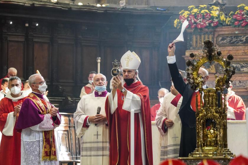 The archbishop of Naples Domenico Battaglia holds a vial believed to contain the blood of the 3rd century saint San Gennaro (Saint Januarius) during the so-called liquefaction miracle, in the Chapel of the Treasury, in Naples, Italy, 19 September 2021. Faithful gather three times a year to witness the liquefaction of the otherwise coagulated blood of the saint. EPA/CESARE ABBATE The archbishop of Naples Domenico Battaglia holds a vial believed to contain the blood of the 3rd century saint San Gennaro (Saint Januarius) during the so-called liquefaction miracle, in the Chapel of the Treasury, in Naples, Italy, 19 September 2021. Faithful gather three times a year to witness the liquefaction of the otherwise coagulated blood of the saint. EPA/CESARE ABBATE