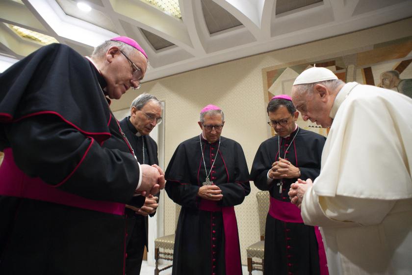 This photo taken and handout on October 6, 2021 by The Vatican Media shows Pope Francis (R) gathering, prior to holding his weekly general audience in The Vatican, with four French bishops visiting Rome (From L) Yves Le Saux, Laurent Dognin, Pierre-Yves Michel and Emmanuel Gobilliard, for a moment of silent prayer for the victims of abuse committed by members of the clergy, in the aftermath of the publication of the Report of the independent commission on sexual abuse of children by French Catholic clergy (CIASE). Pope Francis on October 6, 2021 expressed his "shame" at the sexual abuse of children by French Catholic clergy, laid bare in a devastating report this week. Handout / VATICAN MEDIA / AFP Pope Francis (R) gathering, prior to holding his weekly general audience in The Vatican, with four French bishops visiting Rome (From L) Yves Le Saux, Laurent Dognin, Pierre-Yves Michel and Emmanuel Gobilliard, for a moment of silent prayer for the victims of abuse committed by members of the clergy, in the aftermath of the publication of the Report of the independent commission on sexual abuse of children by French Catholic clergy