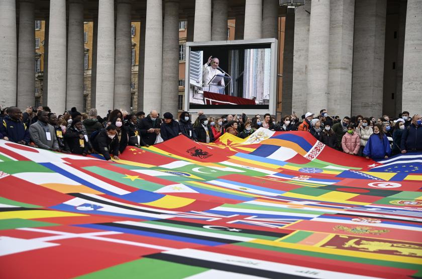 Faithfuls wave a giant patchwork with the flags of the world's countries as Pope Francis leads his Sunday Angelus prayer from the window of his office overlooking Saint Peter's Square, Vatican City, 28 November 2021. EPA/RICCARDO ANTIMIANI Faithfuls wave a giant patchwork with the flags of the world's countries as Pope Francis leads his Sunday Angelus prayer from the window of his office overlooking Saint Peter's Square, Vatican City, 28 November 2021. EPA/RICCARDO ANTIMIANI