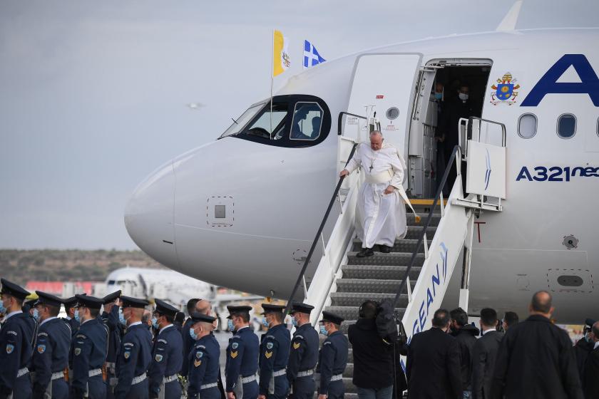 Pope Francis disembark from the plane to a welcome ceremony upon his arrival at the Eleftherios Venizelos international airport, near Athens, Greece, 04 December 2021. The pontiff started a three-day visit to the Mediterranean island nation of Cyprus, before traveling on 04 December to Greece, where he will stay until 06 December. EPA/ALESSANDRO DI MEO Pope Francis disembark from the plane to a welcome ceremony upon his arrival at the Eleftherios Venizelos international airport, near Athens, Greece, 04 December 2021. The pontiff started a three-day visit to the Mediterranean island nation of Cyprus, before traveling on 04 December to Greece, where he will stay until 06 December.