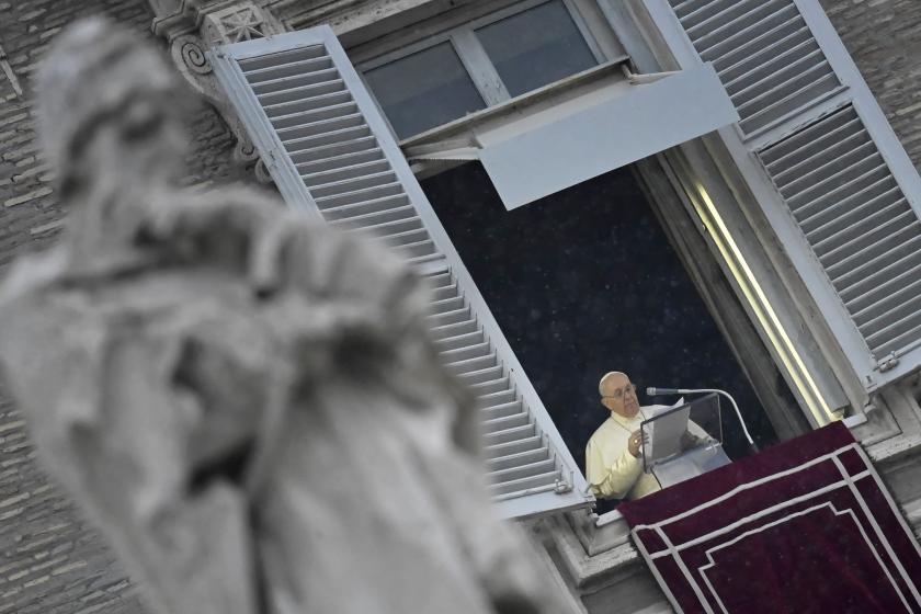 Pope Francis addresses the crowd from the window of the apostolic palace overlooking St.Peter's square during his Angelus prayer at the Vatican, on January 9, 2022. Alberto PIZZOLI / AFP Pope Francis addresses the crowd from the window of the apostolic palace overlooking St.Peter's square during his Angelus prayer at the Vatican, on January 9, 2022.