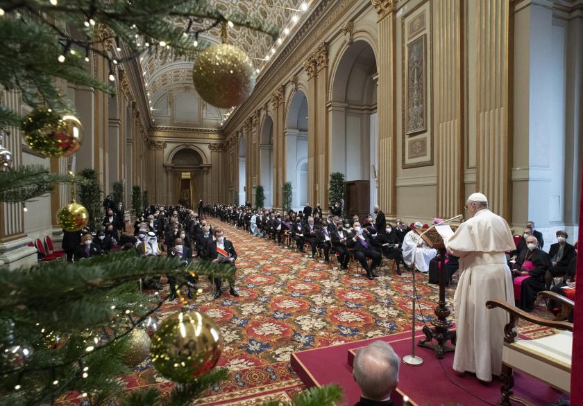 This handout photo taken on January 10, 2022 and released by the Vatican press office, the Vatican Media, shows Pope Francis during his new year greetings to the diplomatic corps at the Vatican on January 10, 2022. This handout photo taken on January 10, 2022 and released by the Vatican press office, the Vatican Media, shows Pope Francis during his new year greetings to the diplomatic corps at the Vatican on January 10, 2022.