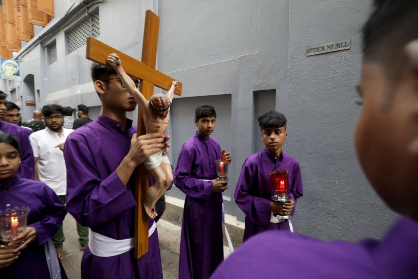 A Christian boy carries a crucifix during a prayer service at the Mother House Of The Missionaries Of Charity, on Good Friday in Kolkata, India, 15 April 2022. Good Friday is a religious holiday observed by Christians in commemoration of the crucifixion of Jesus Christ. EPA/PIYAL ADHIKARY A Christian boy carries a crucifix during a prayer service at the Mother House Of The Missionaries Of Charity, on Good Friday in Kolkata, India, 15 April 2022. Good Friday is a religious holiday observed by Christians in commemoration of the crucifixion of Jesus Christ.