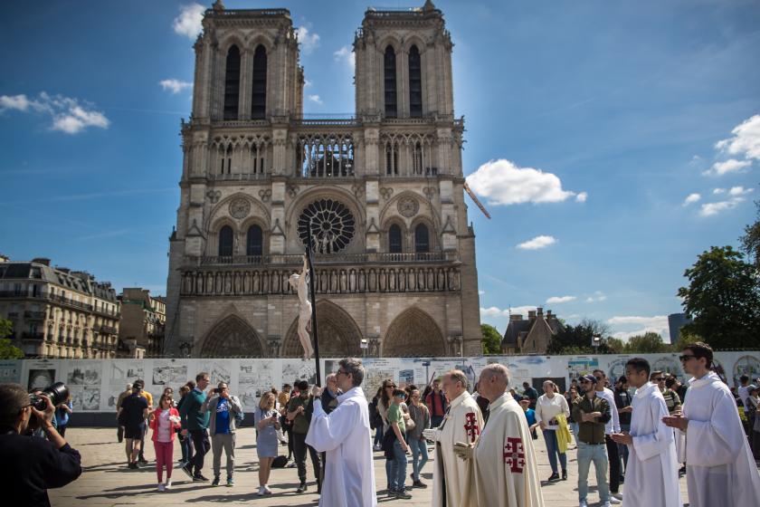 Worshipers and priests take part in a procession on Good Friday in front of the Notre-Dame Cathedral as part of the Good Friday celebrations in Paris, France, 15 April 2022. Good Friday is the one of the highest religious holidays observed by Christians all over the world, commemorating the crucifixion of Jesus Christ and coincides this year with the 3rd anniversary of the fire that ravaged the Notre-Dame de Paris cathedral. EPA/CHRISTOPHE PETIT TESSON Worshipers and priests take part in a procession on Good Friday in front of the Notre-Dame Cathedral as part of the Good Friday celebrations in Paris, France, 15 April 2022. Good Friday is the one of the highest religious holidays observed by Christians all over the world, commemorating the crucifixion of Jesus Christ and coincides this year with the 3rd anniversary of the fire that ravaged the Notre-Dame de Paris cathedral.