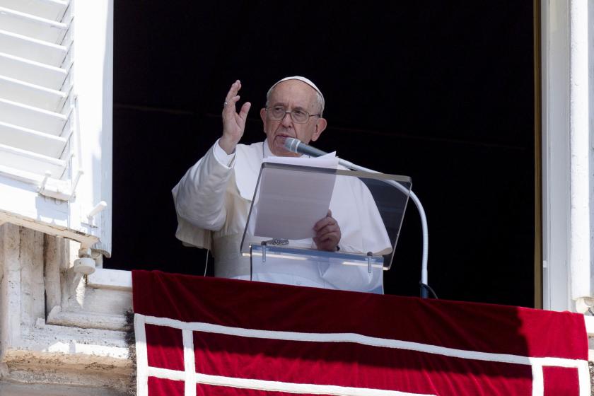 A handout picture provided by the Vatican Media shows Pope Francis leading Sunday Angelus Prayer from the window of his office at the Vatican, 12 June 2022