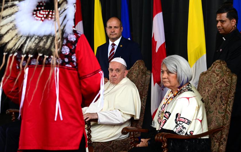 Pope Francis, next to Governor General of Canada Mary Simon (R), attends his welcoming ceremony at Edmonton International Airport in Alberta, western Canada, on July 24, 2022. Pope Francis visits Canada for a chance to personally apologize to Indigenous survivors of abuse committed over a span of decades at residential schools run by the Catholic Church. Vincenzo PINTO / AFP Pope Francis, next to Governor General of Canada Mary Simon (R), attends his welcoming ceremony at Edmonton International Airport in Alberta, western Canada, on July 24, 2022. Pope Francis visits Canada for a chance to personally apologize to Indigenous survivors of abuse committed over a span of decades at residential schools run by the Catholic Church. Vincenzo PINTO / AFP