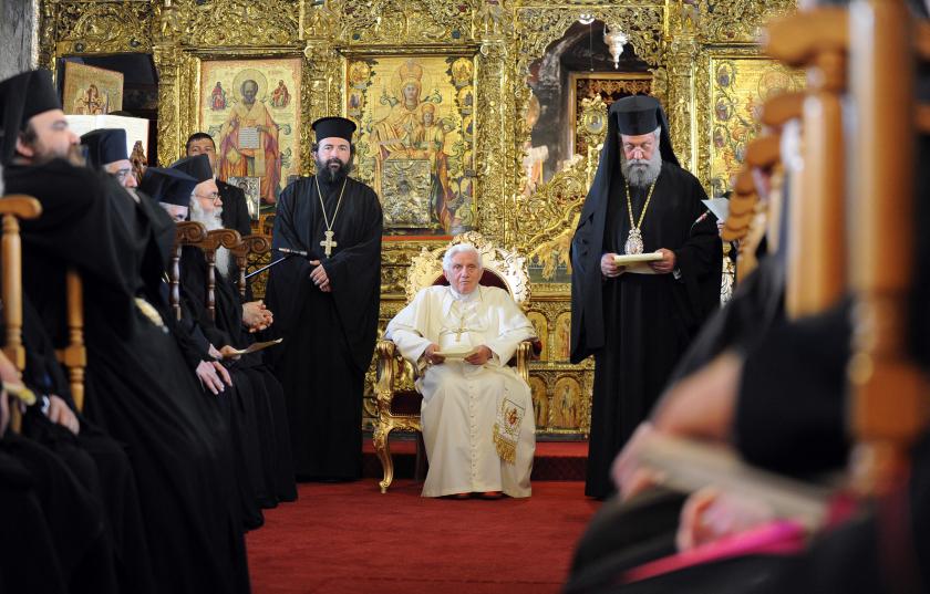 Pope Benedict XVI (back-C) meets with Orthodox priests (L) at a church in the residence of the Archbishop of Cyprus Chrysostomos II (R) in Nicosia on June 5, 2010 on the second day of the pontiff's visit to the mainly Greek Orthodox Mediterranean island. AFP PHOTO/ALBERTO PIZZOLI Pope Benedict XVI (back-C) meets with Orthodox priests (L) at a church in the residence of the Archbishop of Cyprus Chrysostomos II (R) in Nicosia on June 5, 2010 on the second day of the pontiff's visit to the mainly Greek Orthodox Mediterranean island. AFP PHOTO/ALBERTO PIZZOLI