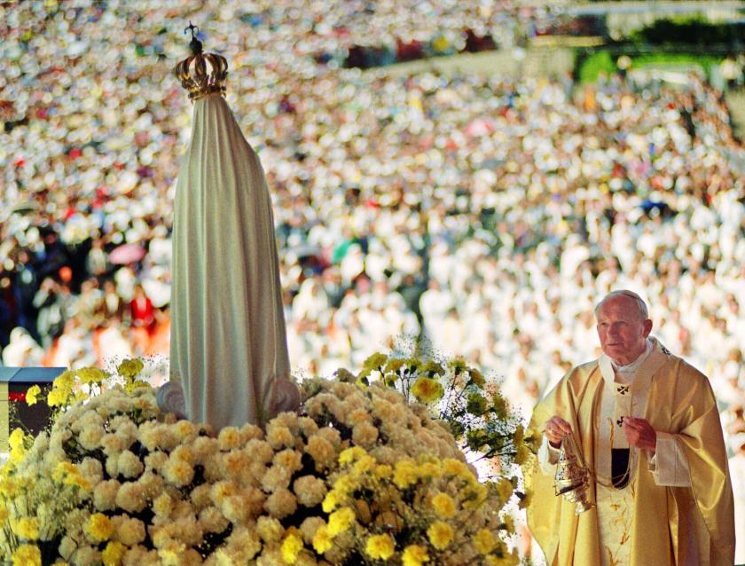 Pope John Paul II celebrates a mass 12 May 1991 in the Chapel of the Apparition in front of the statue of Virgin of Fatima in Fatima where about a million believers attended the Procession of Candles. Pope John Paul II is "ready" to die, one of the leaders of the Polish community in Rome, Father Konrad Hejmo, told reporters 01 April 2005. AFP PHOTO FILES DERRICK CEYRAC Pope John Paul II celebrates a mass 12 May 1991 in the Chapel of the Apparition in front of the statue of Virgin of Fatima in Fatima where about a million believers attended the Procession of Candles. Pope John Paul II is "ready" to die, one of the leaders of the Polish community in Rome, Father Konrad Hejmo, told reporters 01 April 2005. AFP PHOTO FILES DERRICK CEYRAC