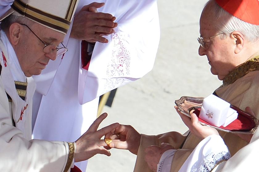 Italian cardinal Angelo Sodano (R) puts the Fisherman's Ring, made of gold-plated silver, on a finger of Pope Francis during his grandiose inauguration mass on March 19, 2013 at the Vatican. Pope Francis swept into St Peter's Square on Tuesday to greet throngs of pilgrims before a sumptuous ceremony in which Latin America's first pontiff will receive the formal symbols of papal power. AFP PHOTO / ALBERTO PIZZOLI Alberto PIZZOLI / AFP Italian cardinal Angelo Sodano (R) puts the Fisherman's Ring, made of gold-plated silver, on a finger of Pope Francis during his grandiose inauguration mass on March 19, 2013 at the Vatican. Pope Francis swept into St Peter's Square on Tuesday to greet throngs of pilgrims before a sumptuous ceremony in which Latin America's first pontiff will receive the formal symbols of papal power. AFP PHOTO / ALBERTO PIZZOLI Alberto PIZZOLI / AFP