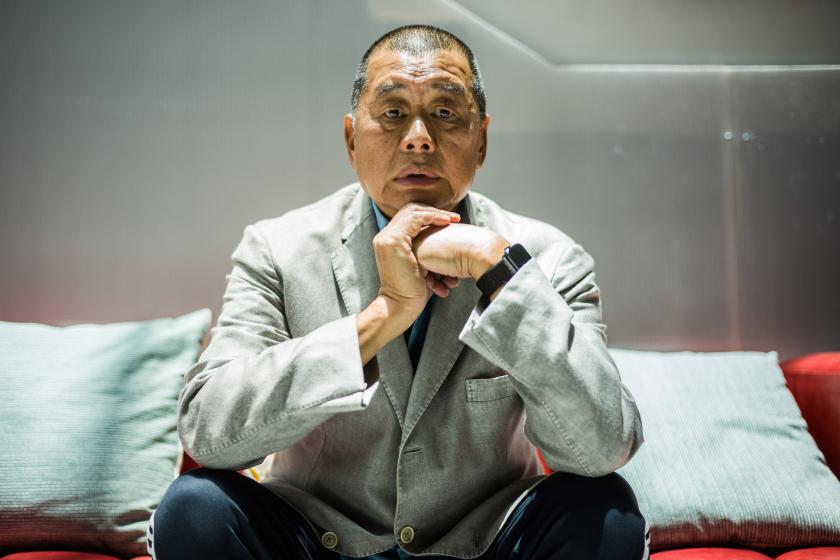 In this picture taken on June 16, 2020, millionaire media tycoon Jimmy Lai, 72, poses during an interview with AFP at the Next Digital offices in Hong Kong. Lai knows his support for Hong Kong's pro-democracy protests could soon land him behind bars, but the proudly self-described "troublemaker" says he has no regrets. Anthony WALLACE / AFP