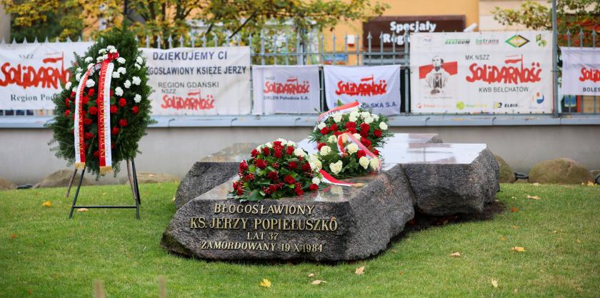 Ceremony of laying flowers in front of the tomb of Blessed Father Jerzy Popieluszko on the grounds of St. Stanislaw Kostka Church in Warsaw, Poland, Ceremony of laying flowers in front of the tomb of Blessed Father Jerzy Popieluszko on the grounds of St. Stanislaw Kostka Church in Warsaw, Poland,