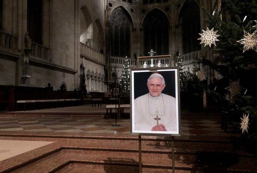 A portrait of Pope Emeritus Benedict XVI is seen near the altar at the Cathedral of Regensburg, southern Germany on December 29, 2022, during a church service. Former pope Benedict XVI remains in a serious but stable condition, Italian media reported on December 29, the day after the Vatican revealed the 95-year-old's health had deteriorated. Florian CAZERES / AFP A portrait of Pope Emeritus Benedict XVI is seen near the altar at the Cathedral of Regensburg, southern Germany on December 29, 2022, during a church service. Former pope Benedict XVI remains in a serious but stable condition, Italian media reported on December 29, the day after the Vatican revealed the 95-year-old's health had deteriorated. Florian CAZERES / AFP
