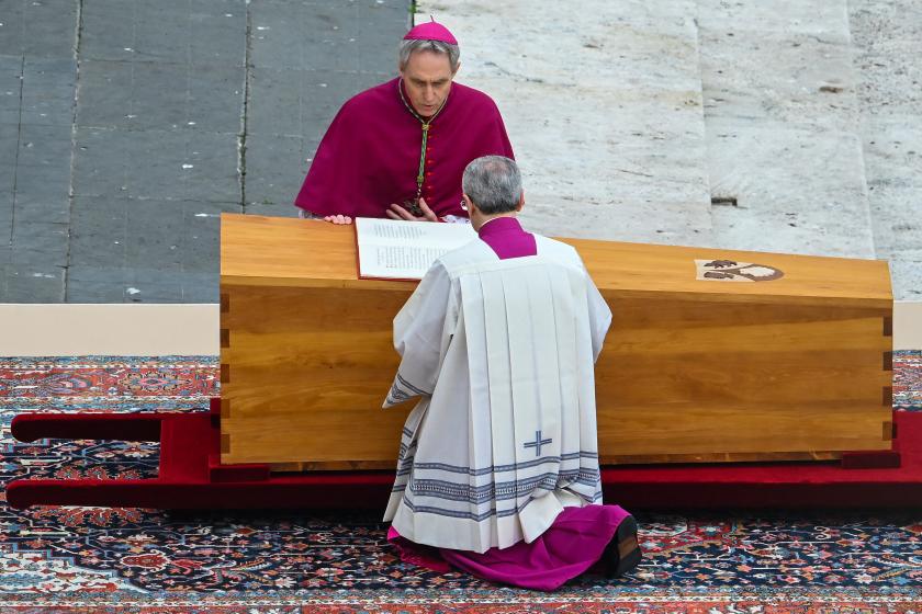German Archbishop Georg Gaenswein (Top) kneels by the coffin of Pope Emeritus Benedict XVI at the start of his funeral mass at St. Peter's square in the Vatican, on January 5, 2023. Pope Francis will preside on January 5 over the funeral of his predecessor Benedict XVI at the Vatican, an unprecedented event in modern times expected to draw tens of thousands of people. Filippo MONTEFORTE / AFP German Archbishop Georg Gaenswein (Top) kneels by the coffin of Pope Emeritus Benedict XVI at the start of his funeral mass at St. Peter's square in the Vatican, on January 5, 2023. Pope Francis will preside on January 5 over the funeral of his predecessor Benedict XVI at the Vatican, an unprecedented event in modern times expected to draw tens of thousands of people. Filippo MONTEFORTE / AFP