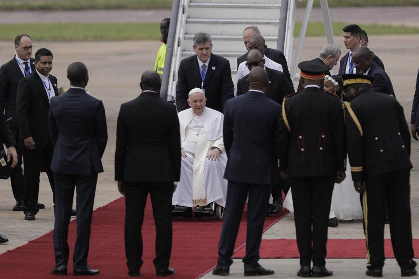Pope Francis (C) arrives at the N'djili International Airport in Kinshasa, Democratic Republic of Congo (DRC), on January 31, 2023. Pope Francis landed in the Democratic Republic of Congo, hailing his beautiful trip to Africa as he comes bearing a message of peace to the conflict-torn nation, before heading to troubled neighbour South Sudan. Alexis Huguet / AFP Pope Francis (C) arrives at the N'djili International Airport in Kinshasa, Democratic Republic of Congo (DRC), on January 31, 2023. Pope Francis landed in the Democratic Republic of Congo, hailing his beautiful trip to Africa as he comes bearing a message of peace to the conflict-torn nation, before heading to troubled neighbour South Sudan. Alexis Huguet / AFP
