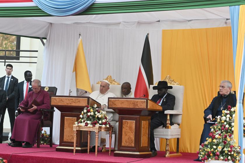 The Archbishop of Canterbury Justin Welby (L), Pope Francis (2nd L), President of South Sudan Salva Kiir (2nd R) and Iain Greenshields from Church of Scotland (R) attend meeting with authorities, leaders of civil society and the diplomatic corps, in the garden of the Presidential Palace in Juba, South Sudan, on February 3, 2023. Pope Francis landed in Juba, in the first visit to South Sudan by a pope since the predominantly Christian nation gained independence from Muslim-majority Sudan in 2011 after decades of bloody struggle. Tiziana FABI / AFP The Archbishop of Canterbury Justin Welby (L), Pope Francis (2nd L), President of South Sudan Salva Kiir (2nd R) and Iain Greenshields from Church of Scotland (R) attend meeting with authorities, leaders of civil society and the diplomatic corps, in the garden of the Presidential Palace in Juba, South Sudan, on February 3, 2023. Pope Francis landed in Juba, in the first visit to South Sudan by a pope since the predominantly Christian nation gained independence from Muslim-majority Sudan in 2011 after decade