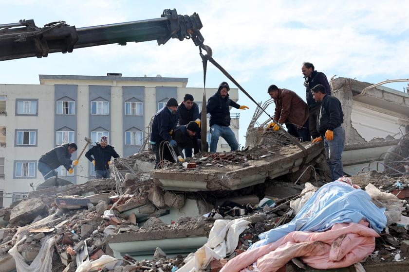 Rescuers and civilians look for survivors under the rubble of collapsed buildings in Kahramanmaras, close to the quake's epicentre, the day after a 7.8-magnitude earthquake struck the country's southeast, on February 7, 2023. Rescuers in Turkey and Syria braved frigid weather, aftershocks and collapsing buildings, as they dug for survivors buried by an earthquake that killed more than 5,000 people. Some of the heaviest devastation occurred near the quake's epicentre between Kahramanmaras and Gaziantep, a ci