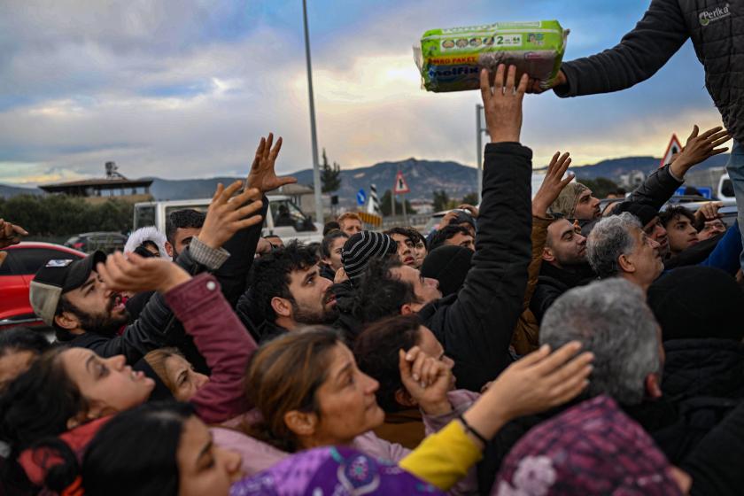 Earthquake survivors gather to collect supplies at a diaper distribution in Hatay on February 7, 2023, a day after a 7,8-magnitude earthquake struck the country's southeast. Rescuers in Turkey and Syria braved frigid weather, aftershocks and collapsing buildings, as they dug for survivors buried by an earthquake that killed more than 5,000 people. Up to 23 million people could be affected by the massive earthquake that has killed thousands in Turkey and Syria, the WHO warned on Tuesday, promising long-term assistance. BULENT KILIC / AFP Earthquake survivors gather to collect supplies at a diaper distribution in Hatay on February 7, 2023, a day after a 7,8-magnitude earthquake struck the country's southeast. Rescuers in Turkey and Syria braved frigid weather, aftershocks and collapsing buildings, as they dug for survivors buried by an earthquake that killed more than 5,000 people. Up to 23 million people could be affected by the massive earthquake that has killed thousands in Turkey and Syria, the WHO warned on Tuesday, promising long-term