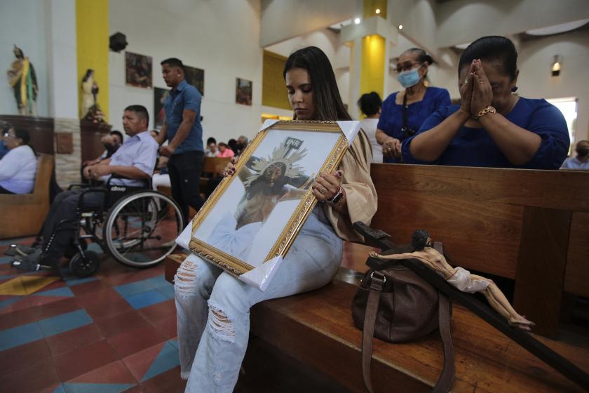 Parishoners attend a mass by Nicaraguan Cardinal Leopoldo Brenes (out of frame) at the Metropolitan Cathedral in Managua, Nicaragua on February 12, 2023. Brenes asked for prayers for Catholic Bishop Rolando Álvarez, who was sentenced to 26 years in prison on February 10 after refusing to go to the United States with released opponents who were expelled from the country. OSWALDO RIVAS / AFP