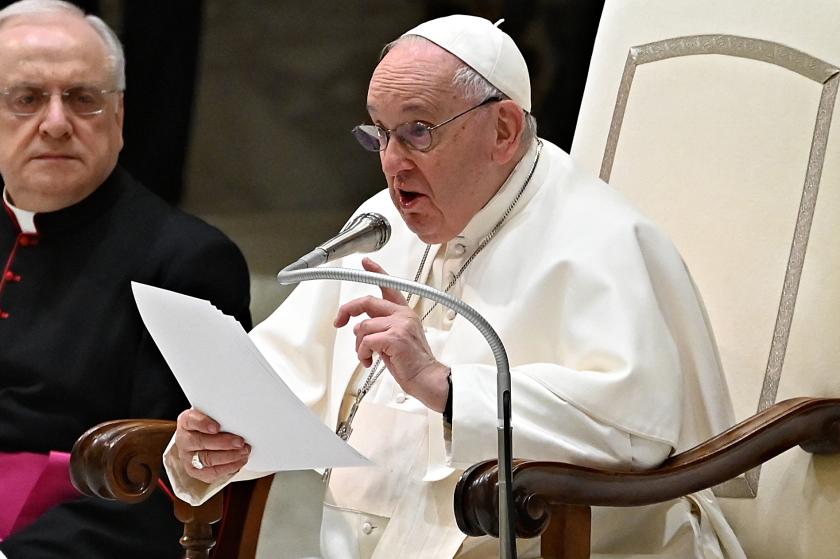 Pope Francis (R), assisted by Prefect of the Pontifical House Monsignor Leonardo Sapienza (L), speaks during the weekly general audience at Paul-VI hall in The Vatican on February 22, 2023. Andreas SOLARO / AFP Pope Francis (R), assisted by Prefect of the Pontifical House Monsignor Leonardo Sapienza (L), speaks during the weekly general audience at Paul-VI hall in The Vatican on February 22, 2023. Andreas SOLARO / AFP