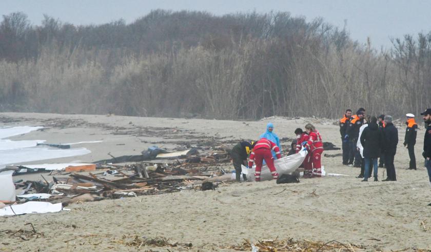 This photo obtained from Italian news agency Ansa, taken on February 26, 2023 shows bags containing the bodies of deceased migrants in Steccato di Cutro, south of Crotone, after their boat sank off Italy's southern Calabria region. More than 30 migrants, including a tiny baby, died after their overloaded boat sank early on February 26, 2023 in stormy seas off Italy's southern Calabria region, Italian media and rescue services reported. STRINGER / ANSA / AFP This photo obtained from Italian news agency Ansa, taken on February 26, 2023 shows bags containing the bodies of deceased migrants in Steccato di Cutro, south of Crotone, after their boat sank off Italy's southern Calabria region. More than 30 migrants, including a tiny baby, died after their overloaded boat sank early on February 26, 2023 in stormy seas off Italy's southern Calabria region, Italian media and rescue services reported. STRINGER / ANSA / AFP
