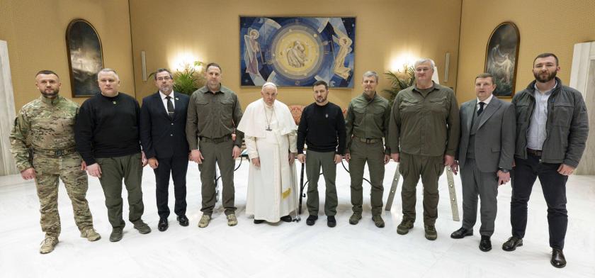 A handout picture provided by the Vatican Media shows Pope Francis (C-L) and Ukraine's President Volodymyr Zelensky (C-R) posing for a group photo during their meeting at the Vatican, 13 May 2023. It is the first time Zelensky visits Italy since the start of the Russian invasion of Ukraine in February 2022. EPA/VATICAN MEDIA 