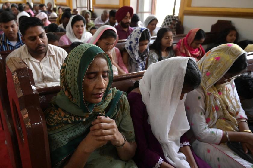 Devotees pay tribute to the victims of train crash, at a church in Amritsar on June 4, 2023. Desperate relatives searched on June 4 for loved ones missing after India's worst train disaster in decades, and the death toll was expected to climb above 288 as authorities searched for clues to the cause. Narinder NANU / AFP Devotees pay tribute to the victims of train crash, at a church in Amritsar on June 4, 2023. Desperate relatives searched on June 4 for loved ones missing after India's worst train disaster in decades, and the death toll was expected to climb above 288 as authorities searched for clues to the cause. Narinder NANU / AFP