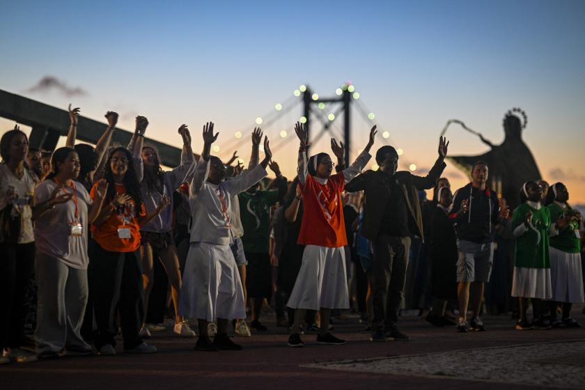 Nuns and pilgrims dance during a vigil at Christ the King Sanctuary in Almada, south of Lisbon, on July 28, 2023. Portugal is preparing to welcome Pope Francis and around a million young pilgrims for the World Youth Day (WYD) from August 1 to 6, 2023. Patricia DE MELO MOREIRA / AFP Nuns and pilgrims dance during a vigil at Christ the King Sanctuary in Almada, south of Lisbon, on July 28, 2023. Portugal is preparing to welcome Pope Francis and around a million young pilgrims for the World Youth Day (WYD) from August 1 to 6, 2023. Patricia DE MELO MOREIRA / AFP