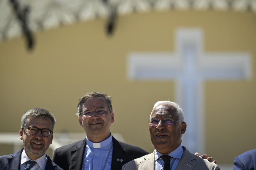 Portuguese Prime Minister Antonio Costa (R) accompanied by Bishop and head of WYD organization Americo Aguiar (C) and Lisbon city mayor Carlos Moedas stand in front of the main stage at the venue for World Youth Day (WYD), where Pope Francis will celebrate the closing mass, in Lisbon on July 31, 2023. Portugal is preparing to welcome Pope Francis and around a million young pilgrims for the World Youth Day (WYD) on August 1 to 6, 2023. Patricia DE MELO MOREIRA / AFP Portuguese Prime Minister Antonio Costa (R) accompanied by Bishop and head of WYD organization Americo Aguiar (C) and Lisbon city mayor Carlos Moedas stand in front of the main stage at the venue for World Youth Day (WYD), where Pope Francis will celebrate the closing mass, in Lisbon on July 31, 2023. Portugal is preparing to welcome Pope Francis and around a million young pilgrims for the World Youth Day (WYD) on August 1 to 6, 2023. Patricia DE MELO MOREIRA / AFP