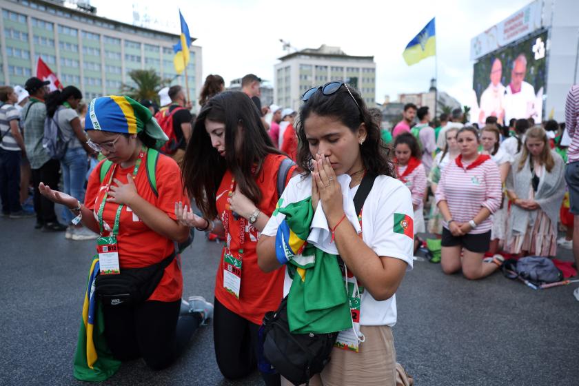 Pilgrims play during the opening mass of the World Youth Day (WYD) gathering of young Catholics in Eduardo VII Park in Lisbon on August 1, 2023. Portugal is expecting about a million pilgrims from around the world, according to organisers, to attend the World Youth Day gathering of young Catholics from August 1 to 6. Originally scheduled for August 2022, the event was postponed because of the Covid-19 pandemic. Thomas COEX / AFP Pilgrims play during the opening mass of the World Youth Day (WYD) gathering of young Catholics in Eduardo VII Park in Lisbon on August 1, 2023. Portugal is expecting about a million pilgrims from around the world, according to organisers, to attend the World Youth Day gathering of young Catholics from August 1 to 6. Originally scheduled for August 2022, the event was postponed because of the Covid-19 pandemic. Thomas COEX / AFP