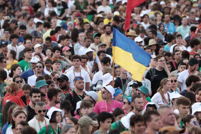 Pilgrims wave a Ukrainian national flag during the opening mass of the World Youth Day (WYD) gathering of young Catholics in Eduardo VII Park in Lisbon on August 1, 2023. Portugal is expecting about a million pilgrims from around the world, according to organisers, to attend the World Youth Day gathering of young Catholics from August 1 to 6. Originally scheduled for August 2022, the event was postponed because of the Covid-19 pandemic. Thomas COEX / AFP Pilgrims wave a Ukrainian national flag during the opening mass of the World Youth Day (WYD) gathering of young Catholics in Eduardo VII Park in Lisbon on August 1, 2023. Portugal is expecting about a million pilgrims from around the world, according to organisers, to attend the World Youth Day gathering of young Catholics from August 1 to 6. Originally scheduled for August 2022, the event was postponed because of the Covid-19 pandemic. Thomas COEX / AFP