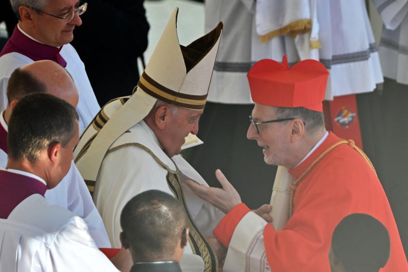 Italian prefect of the Dicastery for the Eastern Churches Claudio Gugerotti (R) is elevated cardinal by Pope Francis during a consistory to create 21 new cardinals at St. Peter's square in The Vatican on September 30, 2023. Pope Francis elevates 21 clergymen from all corners of the world to the rank of cardinal -- most of whom may one day cast ballots to elect his successor. Filippo MONTEFORTE / AFP Italian prefect of the Dicastery for the Eastern Churches Claudio Gugerotti (R) is elevated cardinal by Pope Francis during a consistory to create 21 new cardinals at St. Peter's square in The Vatican on September 30, 2023. Pope Francis elevates 21 clergymen from all corners of the world to the rank of cardinal -- most of whom may one day cast ballots to elect his successor. Filippo MONTEFORTE / AFP