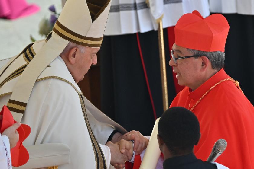 Colombian archbishop from Bogota, Luis Jose Rueda Aparicio (R) is elevated cardinal by Pope Francis during a consistory to create 21 new cardinals at St. Peter's square in The Vatican on September 30, 2023. Pope Francis elevates 21 clergymen from all corners of the world to the rank of cardinal -- most of whom may one day cast ballots to elect his successor. Filippo MONTEFORTE / AFP Colombian archbishop from Bogota, Luis Jose Rueda Aparicio (R) is elevated cardinal by Pope Francis during a consistory to create 21 new cardinals at St. Peter's square in The Vatican on September 30, 2023. Pope Francis elevates 21 clergymen from all corners of the world to the rank of cardinal -- most of whom may one day cast ballots to elect his successor. Filippo MONTEFORTE / AFP
